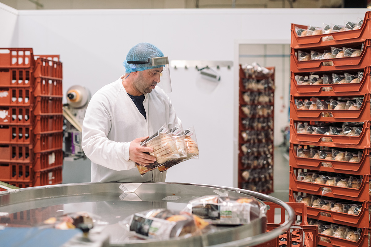 Team Member Sorting Bread - Finsbury Food Group